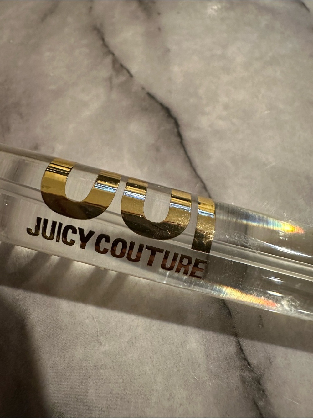 Juicy Couture OUI Eau de Parfum travel spray 10 ml.